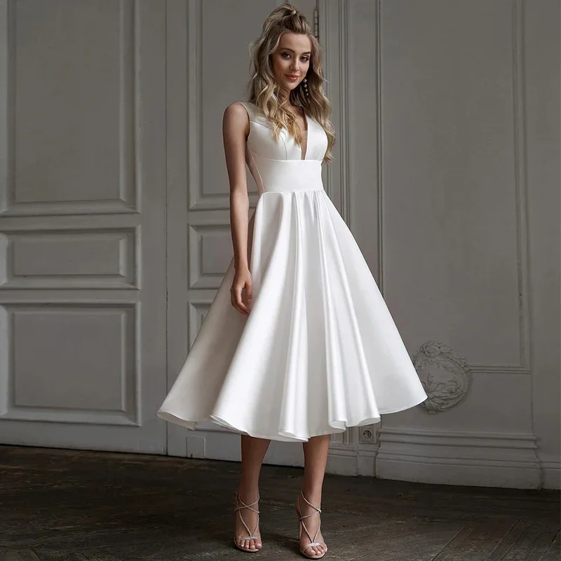 Robes de mariée dos nu une ligne longueur de thé robes de mariée mi-longues personnalisé Simple robe de mariée col en V blanc Satin sans manches court