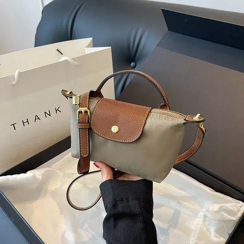 Portefeuille et sacs à main Sacs à main de créateur Sac à bandoulière en nylon Nouveau mini sac fourre-tout pour femme Mode Niche Designer Sacs à bandoulière décontractés