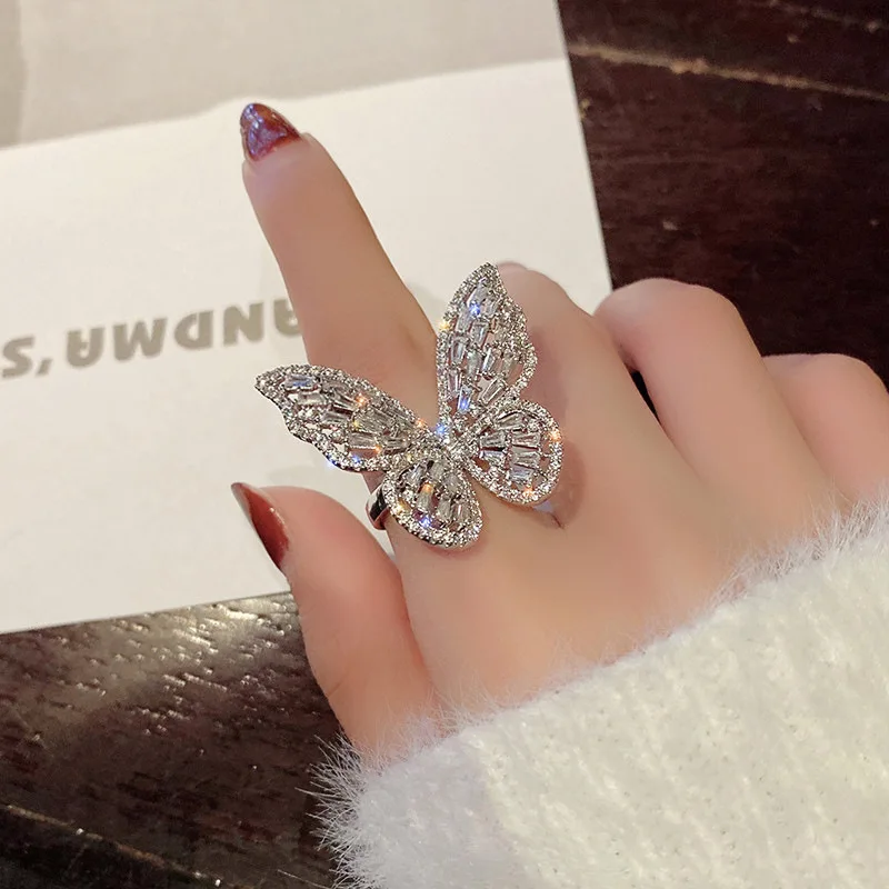 Bague d'ouverture réglable papillon brillant pour femmes, incrustation en cristal acrylique, accessoires de fête à la mode, bijoux