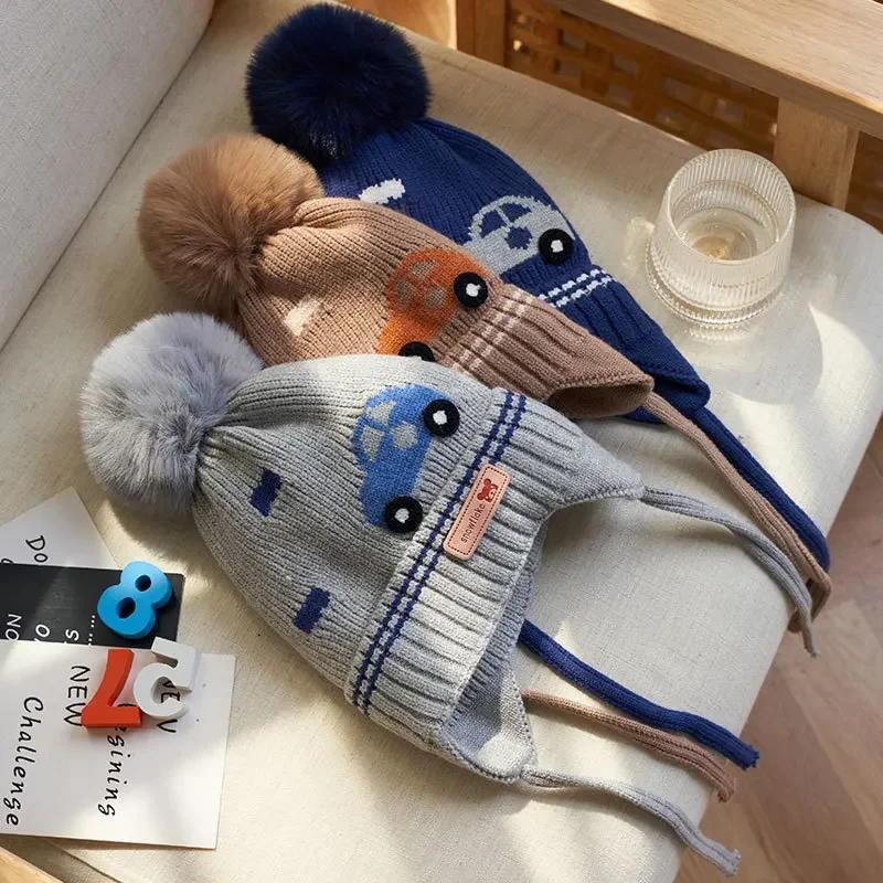 Chapeau d'hiver pour bébé garçon, avec boule de fourrure à oreillettes, Bonnet tricoté pour enfants, accessoires pour nourrissons, doublure polaire de 1 à 4 ans