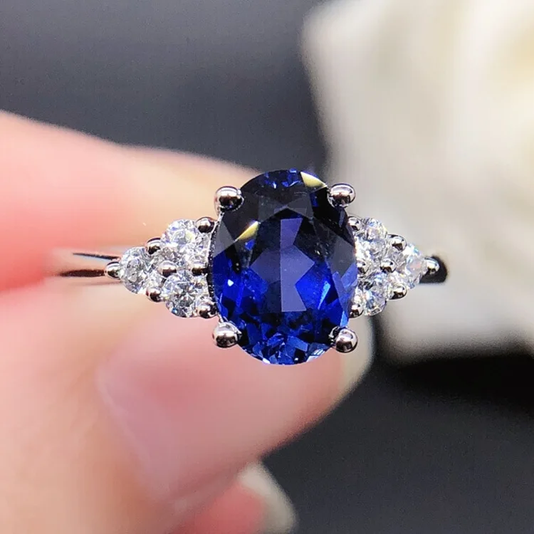 Women's PT950 Platinum Ring 1.5 Carat Sapphire Four-Light Egg-shaped High Carbon Diamond Ring